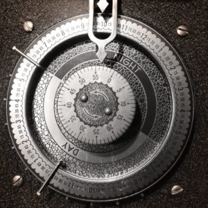 The cover image of the self titled album by This Definite Sky. It is a closeup view of a clock face in black and white. The clock face has the resemblance of a timer.